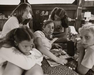 Gillian Segal and Marnie Bernstein with girls on bed, Camp Pinecliffe, Harrison, Maine