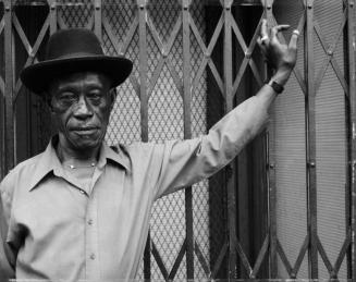 A Man at Fulton Street and Cambridge Place, Brooklyn, NY