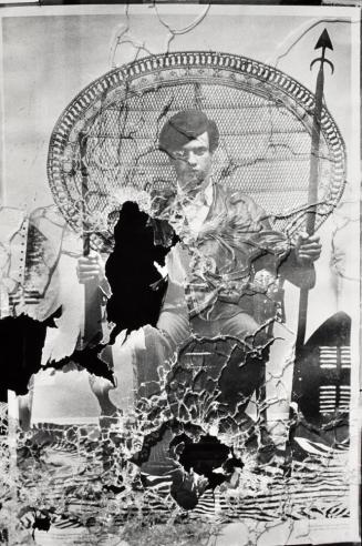 The window of Black Panther Party National Headquarters at Grove and Forty-fifth Streets in Oakland after shots were fired by police following Huey Newton’s murder trial verdict, Oakland, California