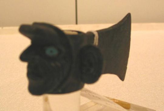 Axe-head with a Human Head