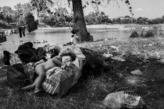 On the Guatemalan side of the river, waiting to cross into Mexico