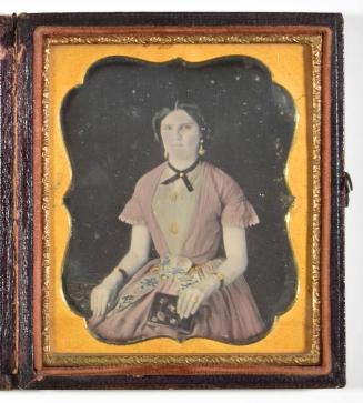 [Young Woman with Gold Jewelry, Holding Book]