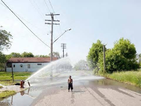 Boy and fire hydrant