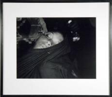 Evacuee Sleeping on Bus Ride to an Alexander, LA Shelter after the Storm