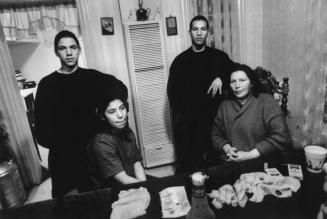 Quiles family at home: Ramiro and Danny from Marianna, with their mother Aida, and sister Maria. East Los Angeles.