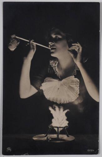 [Photomontage of a Woman with Man's Head Coming out of Cigarette]