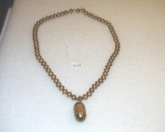 Necklace with granulated pendant