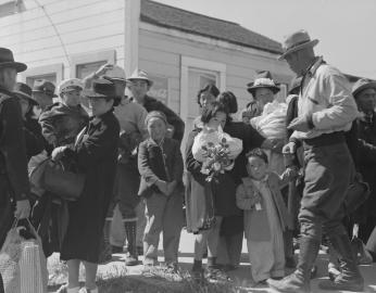 Turlock, California. Families of Japanese ancestry arrived at Turlock Assembly. Evacuees will be housed later at War Relocation Authority centers for the duration.