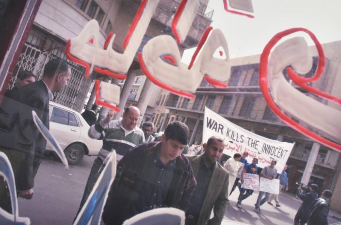 Anti-war demonstrators from the Iraq Peace Team march against a U.S. invasion: Al Rashid Boulevard, Baghdad
