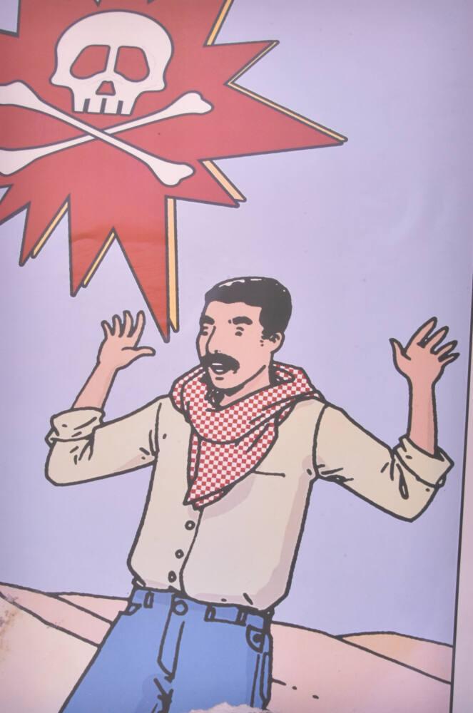 Detail of a poster warning against unexploded munitions, Baghdad
