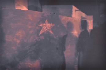 Shadows of Iraqi detainees with U.S. Army captors after curfew, Ar Ramadi