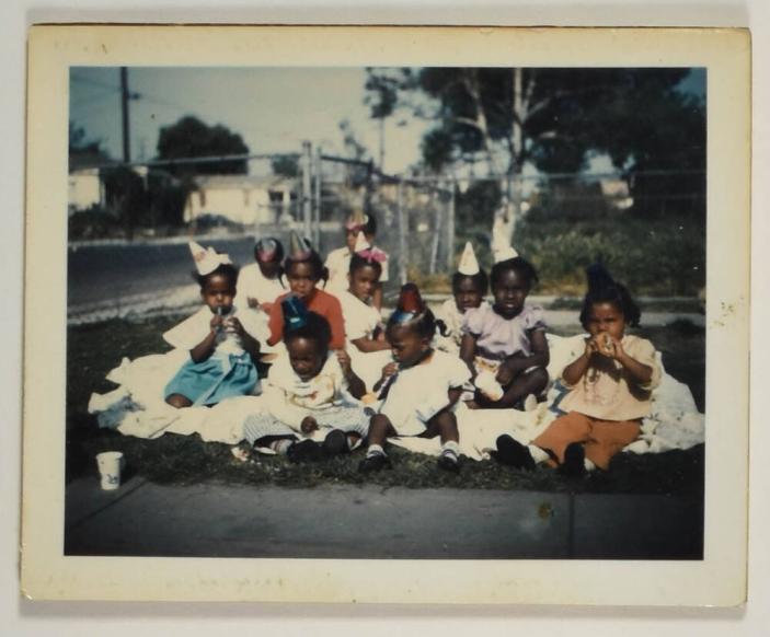 [Group of Young Children at a Picnic Birthday Party, Wearing Party Hats]