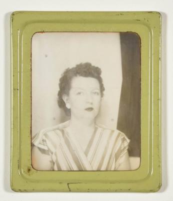 [Woman with Curly Hair and Lipstick, Wearing Stripes]