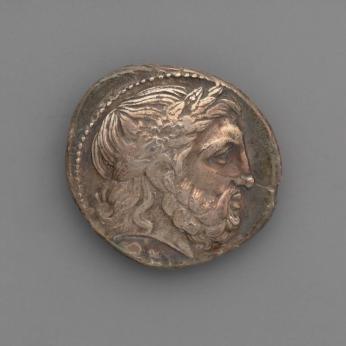 Coin: Tetradrachm of Philip II with Head of Zeus laureate on the obverse; victorious horse and rider on the reverse
