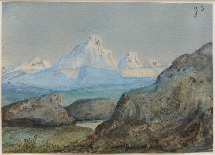 Mountainous Landscape with Snow-Capped Peaks in the Distance