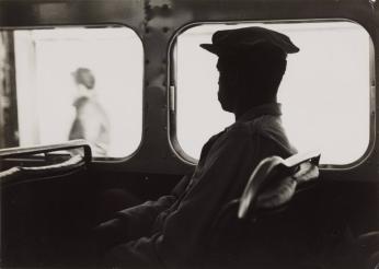 Untitled [Man sitting on the Bus]