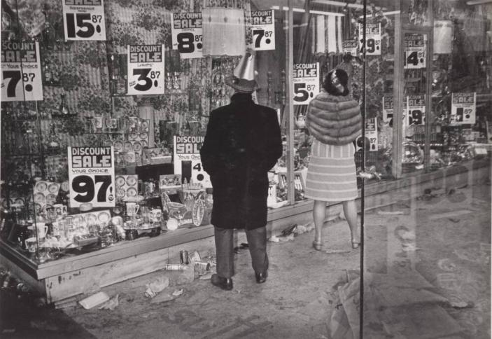 [New Orleans, Louisiana 1974 [Couple in Party Clothes in Front of Discount Store]]