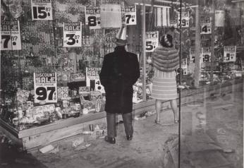 [New Orleans, Louisiana 1974 [Couple in Party Clothes in Front of Discount Store]]