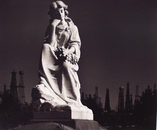 Cemetery Statue and Oil Derricks