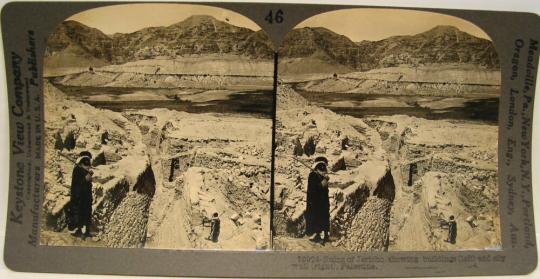 Ruins of Jericho, showing buildings (left) and city wall (right), Palestine.