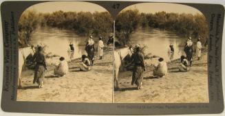 Baptizing in the Jordan, Palestine.