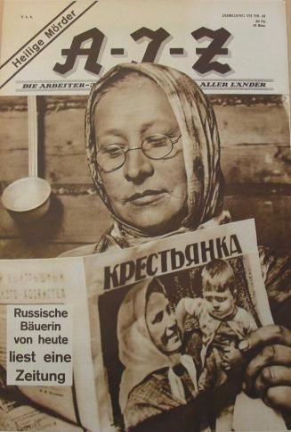 Russiche Bauerin von heute liest eine Zeitung