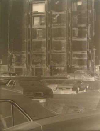 Demolished Building with Cars