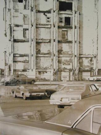 Demolished Building with Cars