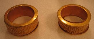 Pair of Ear Ornaments with Repousse Bands