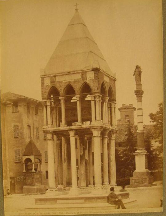 3 Monuments: a. figure on column  b & c. four-sided, covered, containing coffin.  Figure seated on forward monument.