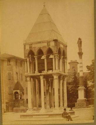 3 Monuments: a. figure on column  b & c. four-sided, covered, containing coffin.  Figure seated on forward monument.