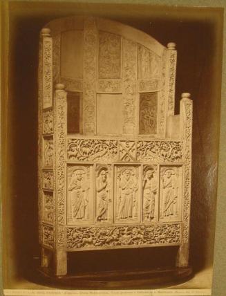 Ivory pastoral throne richly carved with vines, birds, animals and a panel of five male figures.