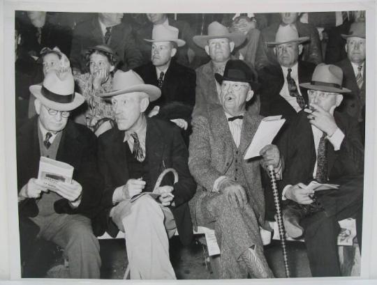 Cattlemen at auction of prize beef steers and breeding stock at San Angelo Fat Stock Show. San Angelo, Texas