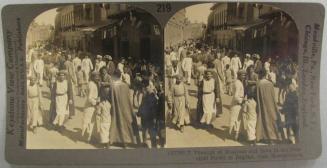 Throngs of Moslems and Jews in the Principal Street of Bagdad, Irak, Mesopotamia