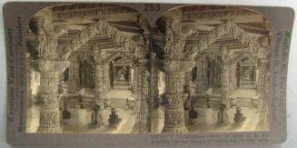 Worshippers before an Image in the Exquisitely Carved Temple of Vimala Sah, Mt. Abu, India.