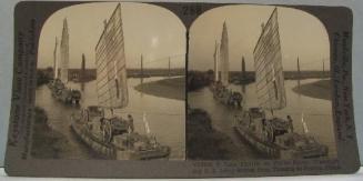 Junk Flotilla on Pei-ho River-Transporting U.S. Army Stores from Tienstin to Peking, China.