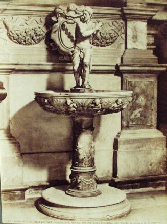 PADOVA - Basilica di S. Antonio.  Pila dell'acqua benedetta.  (XV Secolo la statua è di T. Aspetti)