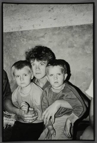Woman and Her 2 Children in Shelter, During Bombing