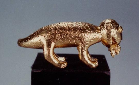 Figure of leopard with antelope in mouth