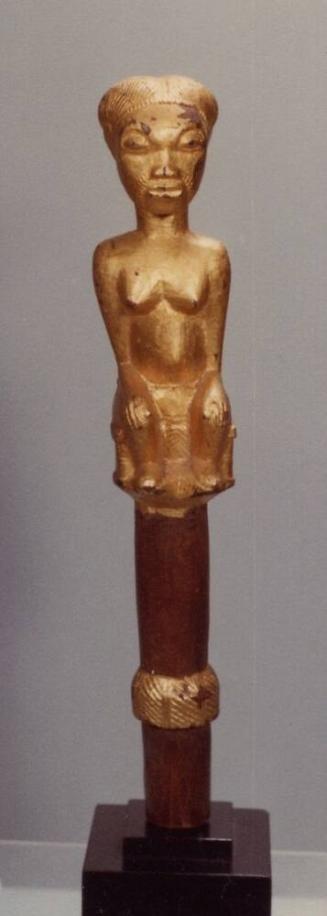 Linguist Staff Finial Representing a Seated Figure