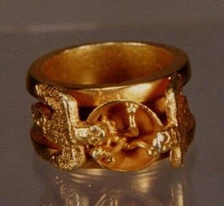 Ring with floral and bird design