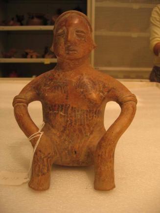 Seated Female Figure with Body Markings