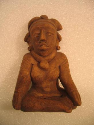 Seated Archaic Figure