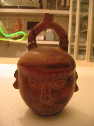 Bridge-Spouted Vessel in the Form of a Human Head
