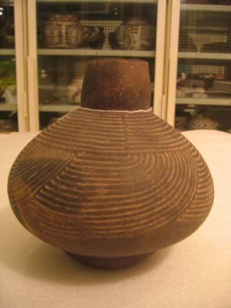 Bottle with Curvilinear Incised Designs