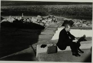 A Man Waiting by the Sea