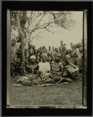 Traditional Birthing Attendant, Nyabahire Esteri Holding Newborns