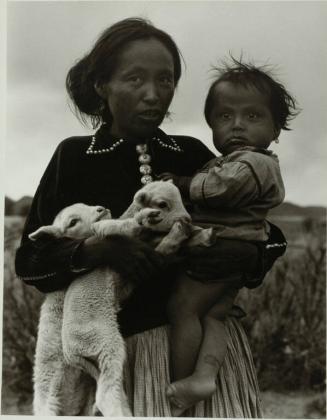 Navaho Woman, Child, and Lambs