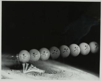 Hitting a Golf Ball (Wilson Staff #9)