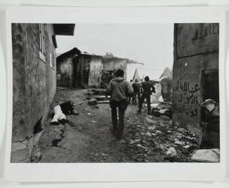 Christian Phalangist soldiers search over a Palestinian neighborhood in order to liquidate any survivors